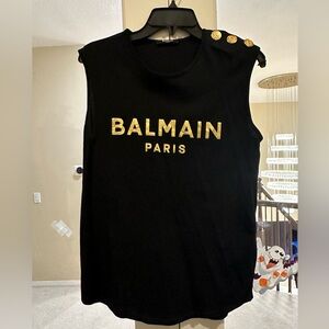 New without tag. Balmain black top. Tag size small but can fit up to a medium.